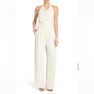 Olivia Palermo Chelsea white jumpsuit with open back